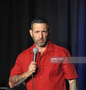 Rich Vos performing at The Stress Factory Comedy Club