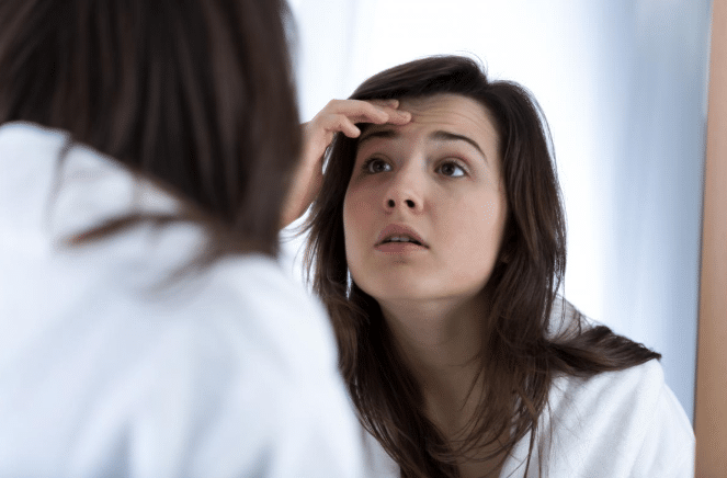 Drugs Affect Looks Woman in Mirror